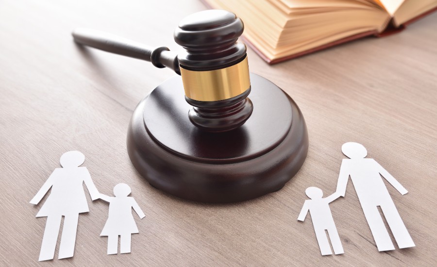 Family court in Hackensack, NJ, showing custody papers and a gavel representing child custody and support cases.