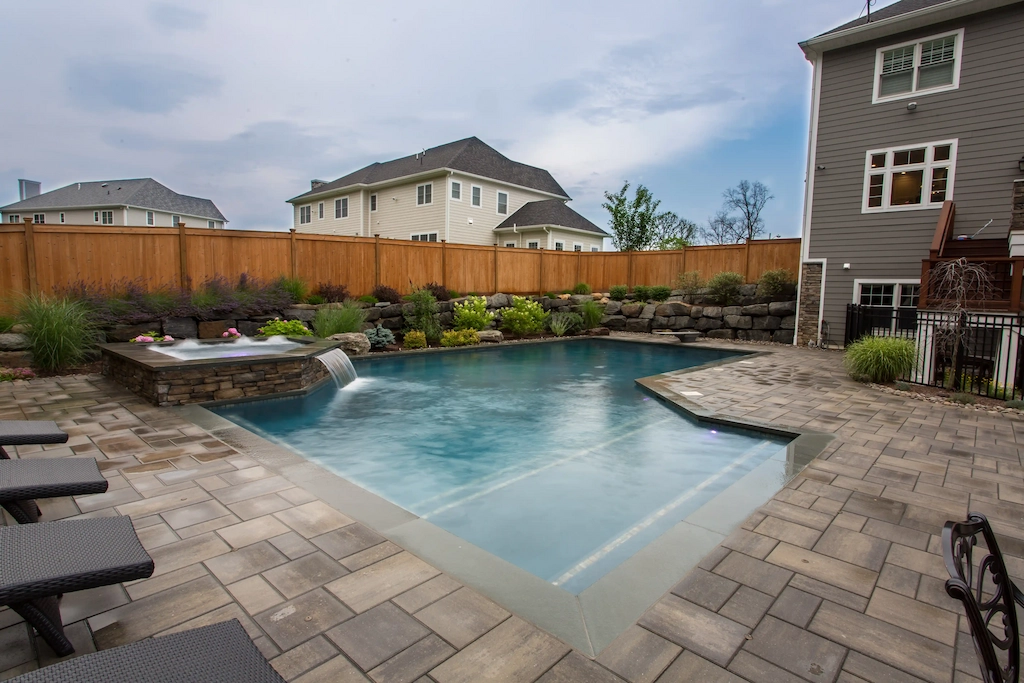 geometric-pool-stacked-stone-spa-tanning-ledge-paver-deck-retaining-wall-lakehurst-nj-gorlin-pools