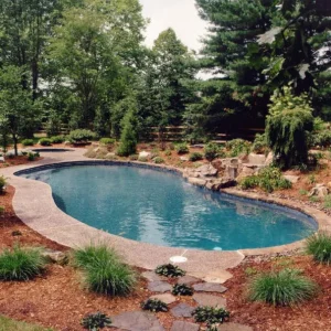 freeform-pool-exposed-aggregate-coping-mulch-garden-flagstone-path-wooded-lakehurst-nj-gorlin-pools