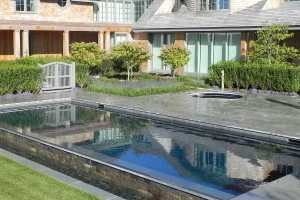inground pool design with integrated spa