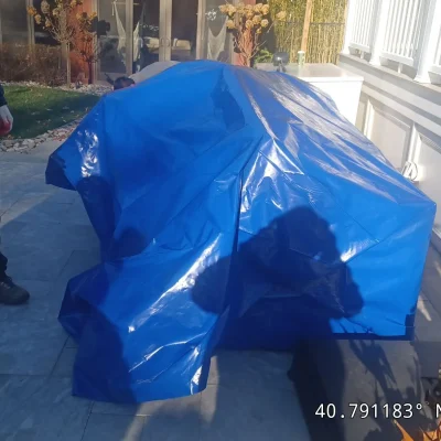 technician-heat-gun-shrink-wrapping-patio-furniture-stone-patio-lakehurst-nj-gorlin-pools